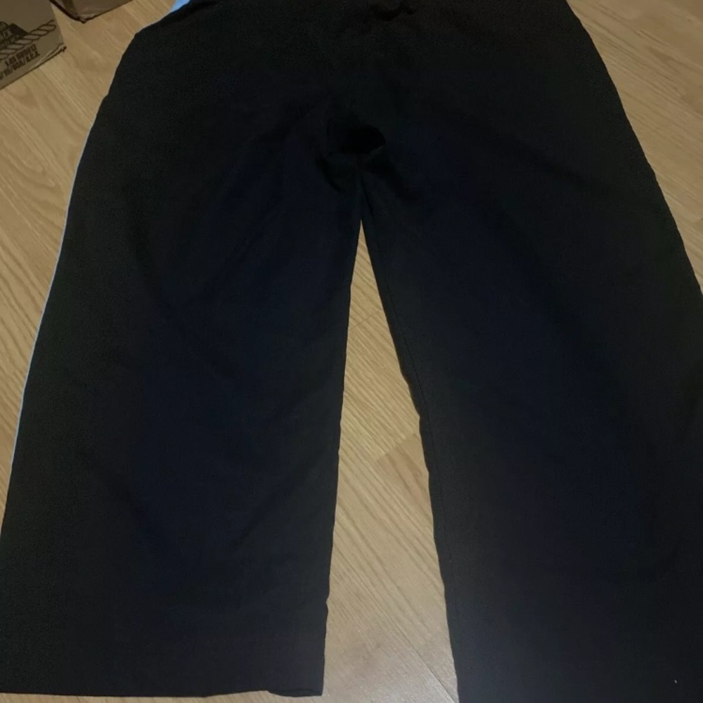 Woman’s Nike Capri style pants with pretty stripe